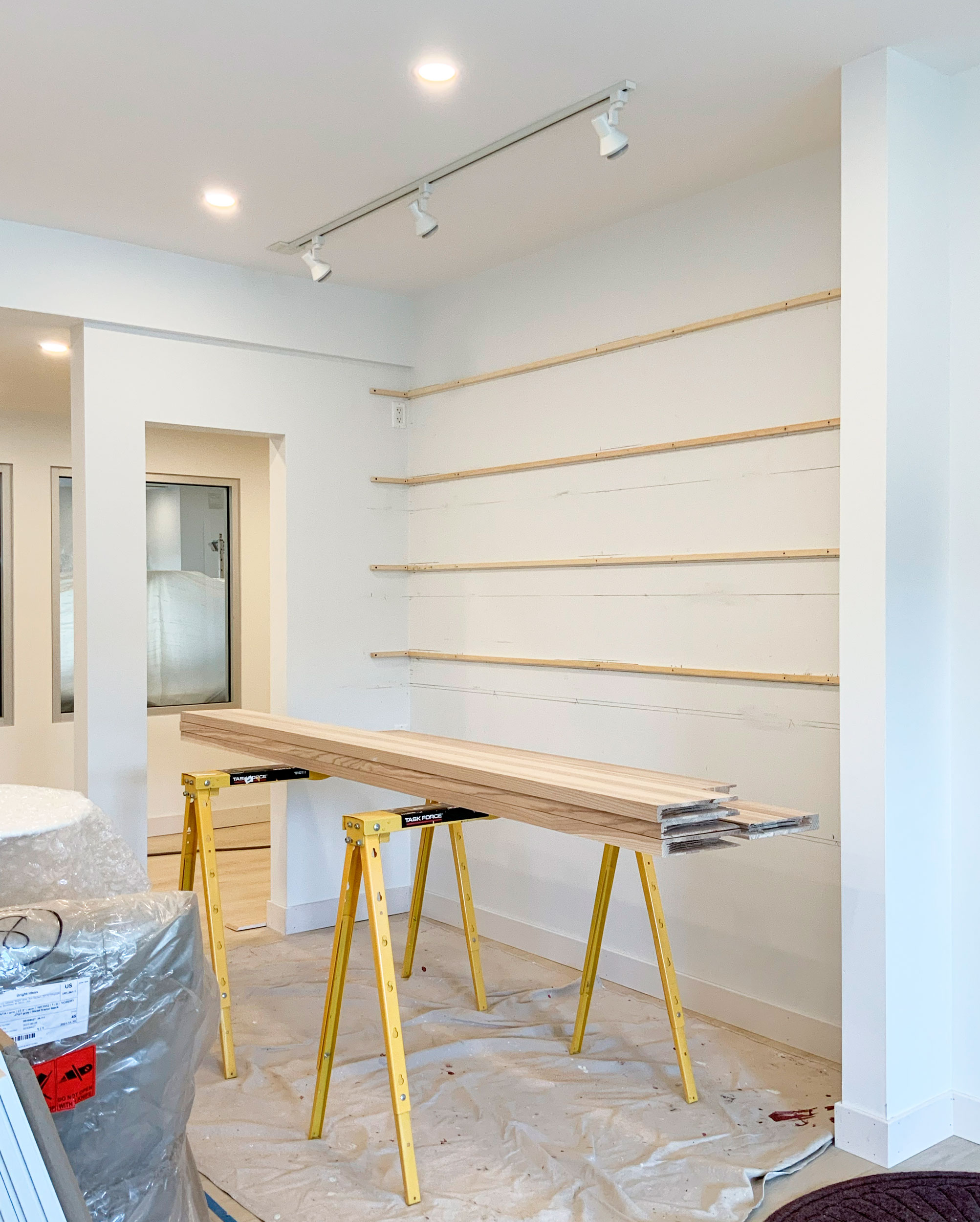 Supports were designed to keep Ash shelving from warping.