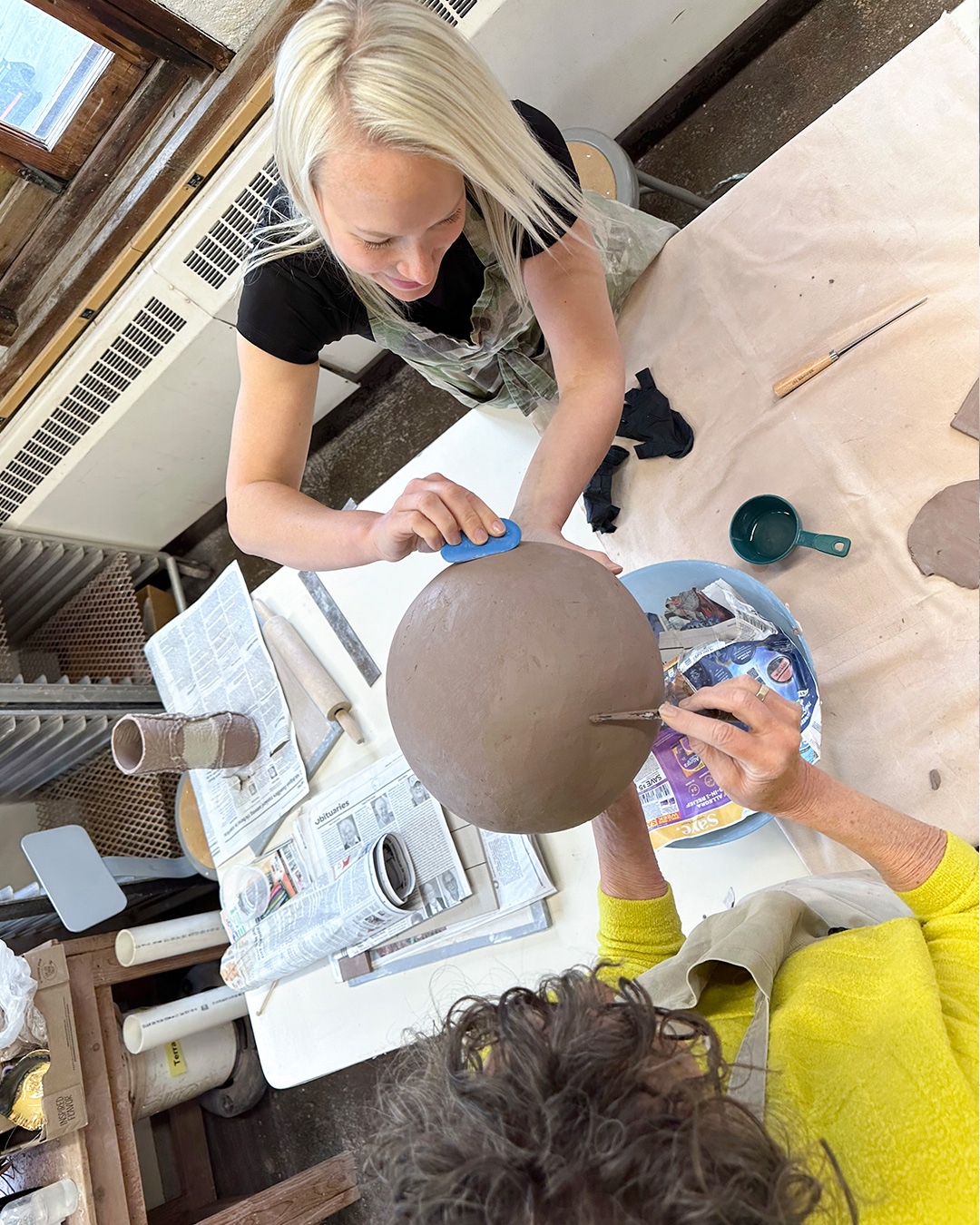Hand-building at the Pewabic studio in Detroit.